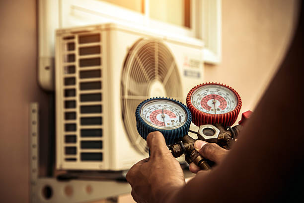 Professional Hvac technician working in Dennis, MA